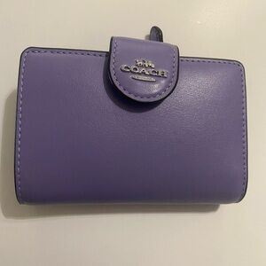 Coach light violet medium corner zip wallet